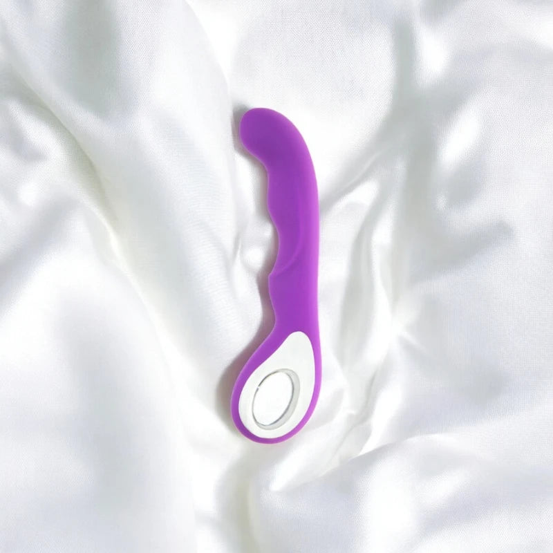 A purple vibrator with a curved ergonomic loop handle.