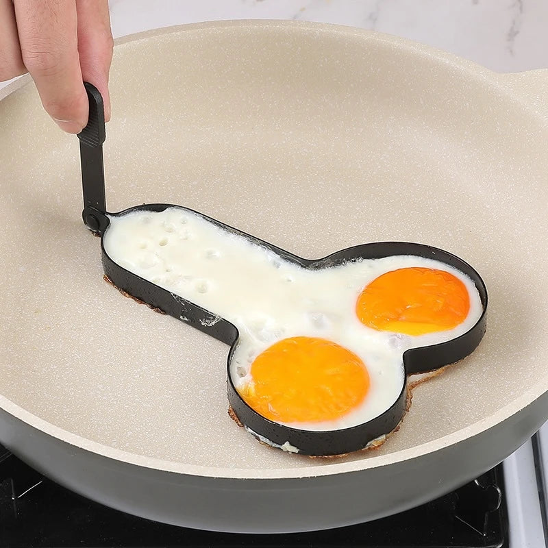 An egg fryer mould in a sexual shape of a penis.