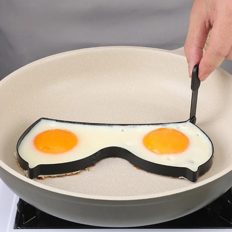An egg fryer mould in a sexual shape of boobs.
