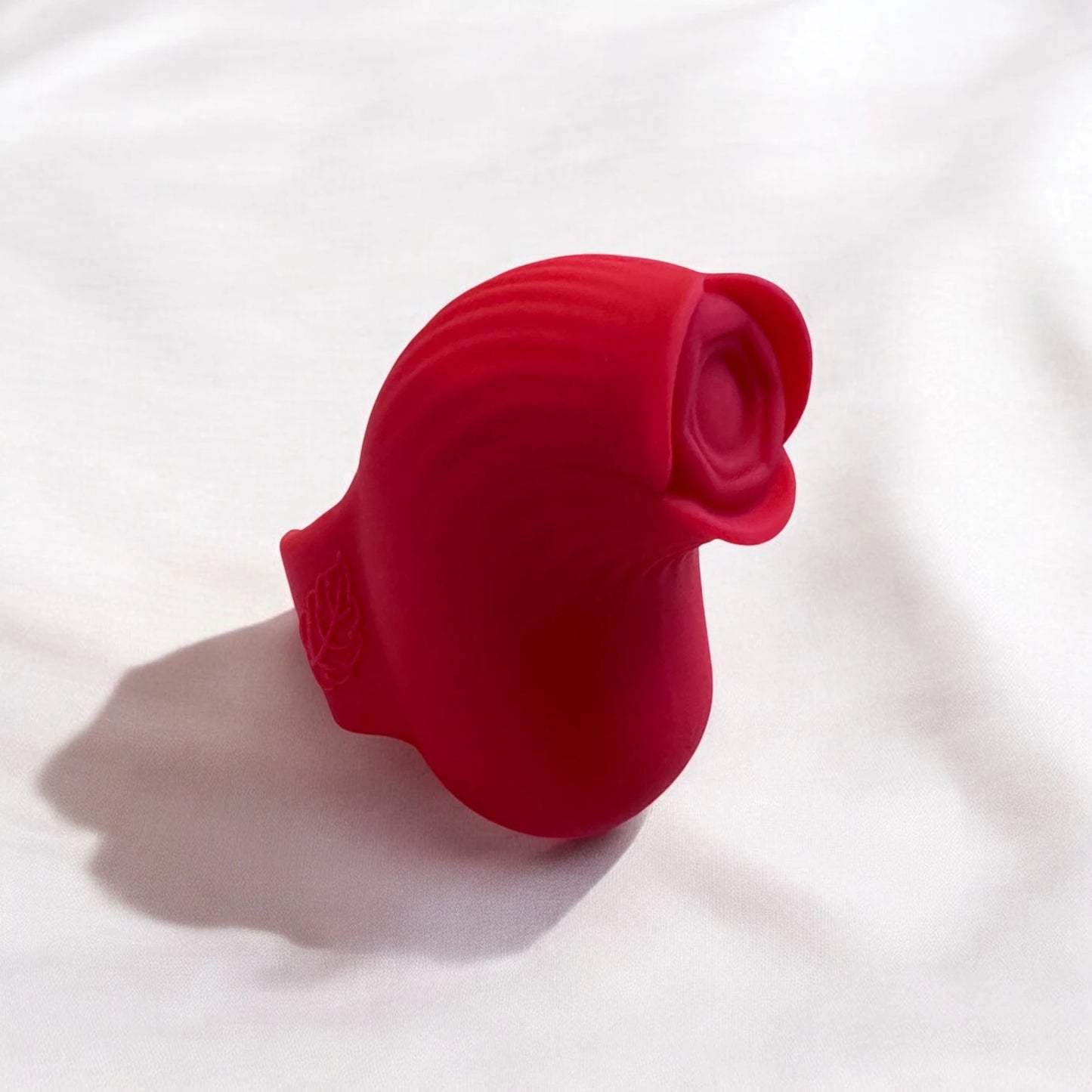 A small and handy red rose shaped finger vibrator designed to be worn on the finger for pinpoint precision.