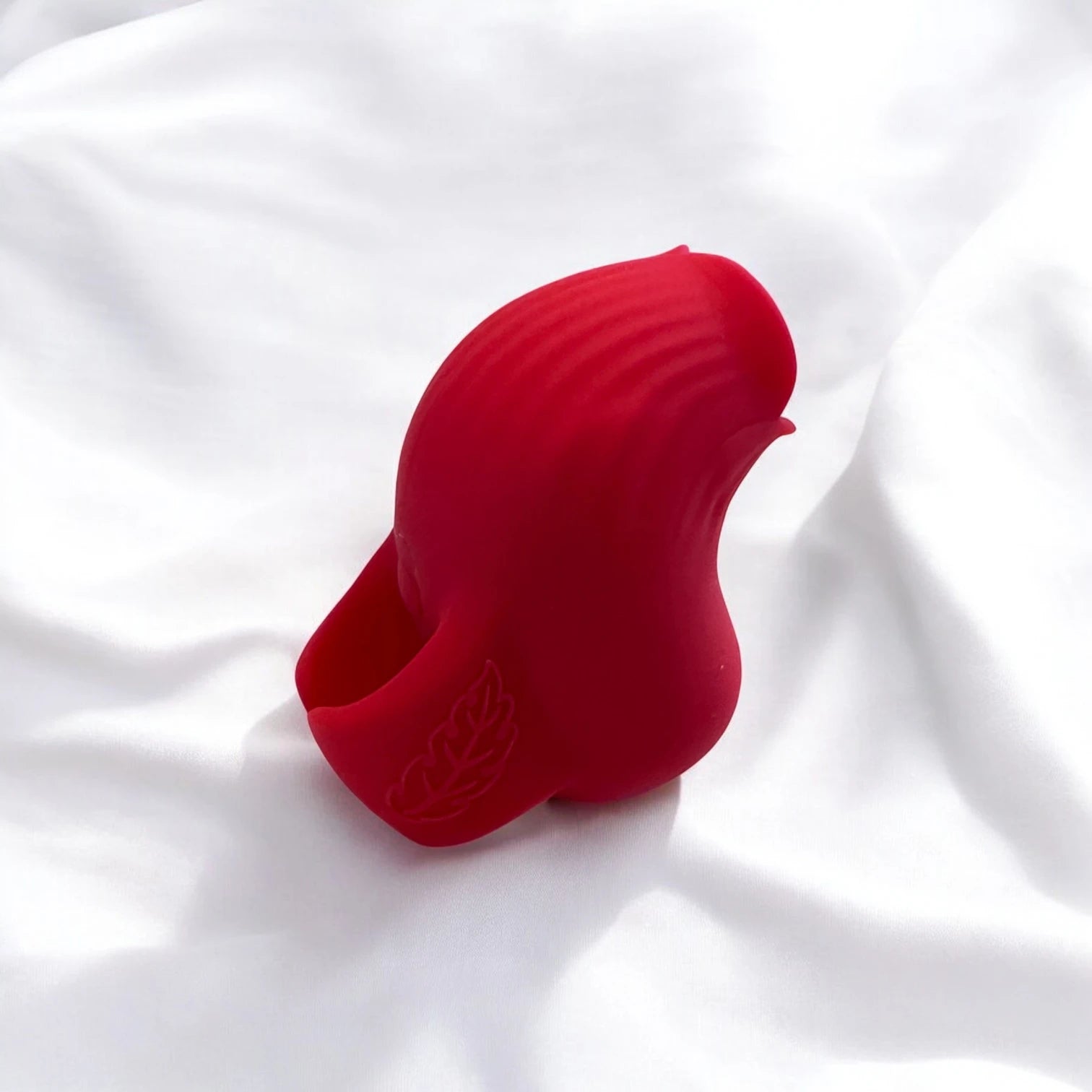 A small and handy red rose shaped finger vibrator designed to be worn on the finger for pinpoint precision.