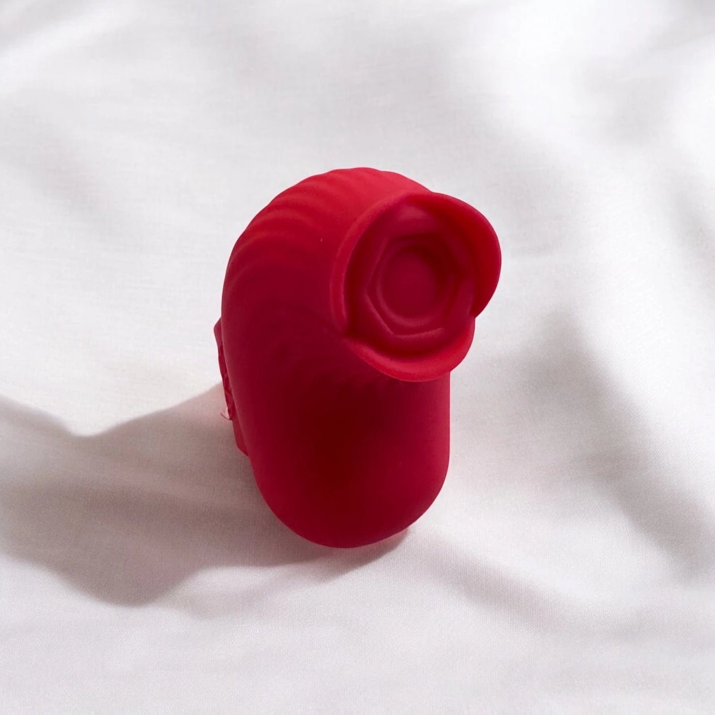 A small and handy red rose shaped finger vibrator designed to be worn on the finger for pinpoint precision.