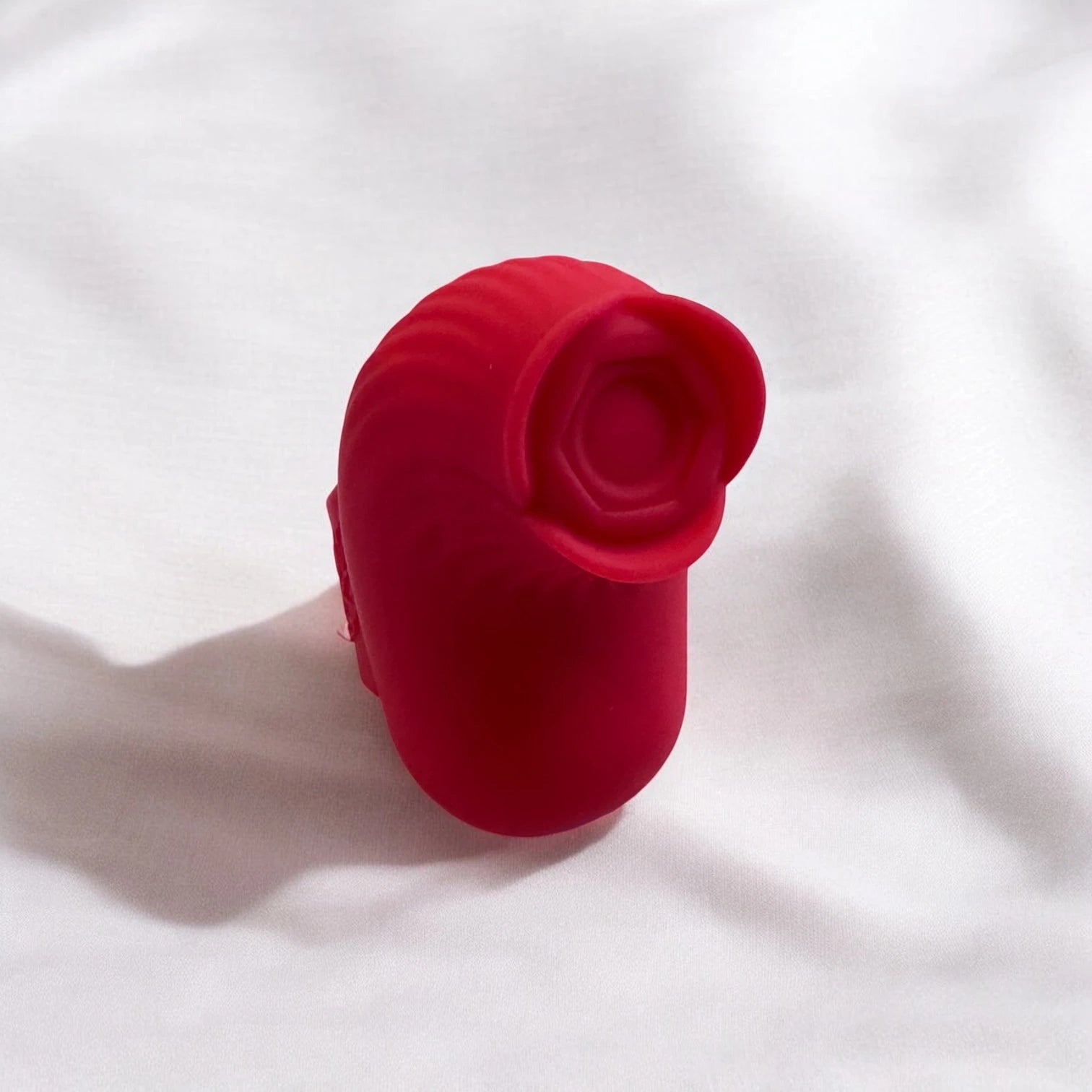 A small and handy red rose shaped finger vibrator designed to be worn on the finger for pinpoint precision.