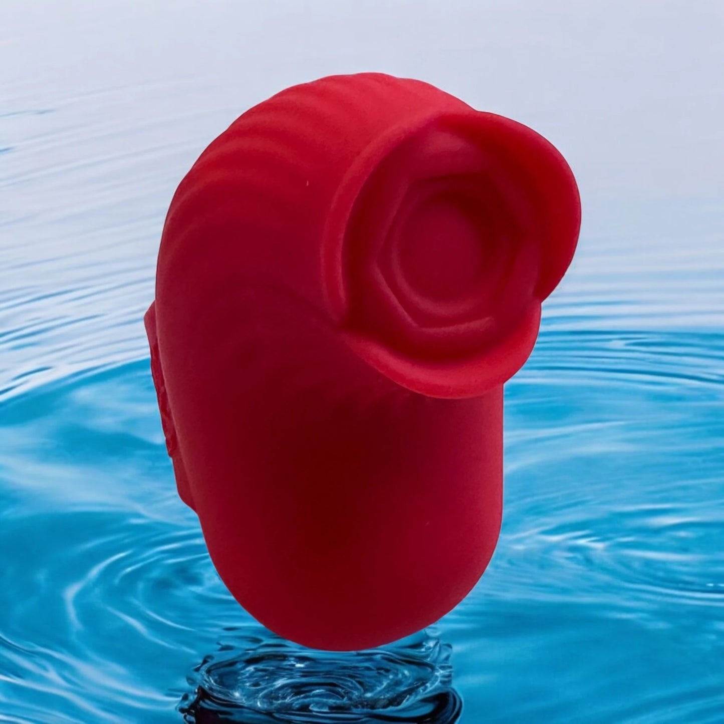 A small and handy red rose shaped finger vibrator designed to be worn on the finger for pinpoint precision.