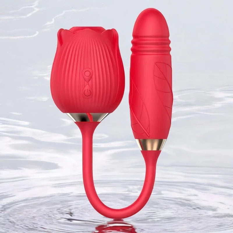 A red rose shaped vibrator with a dual end, one end with a rose head with suction and the other a thrusting wand.