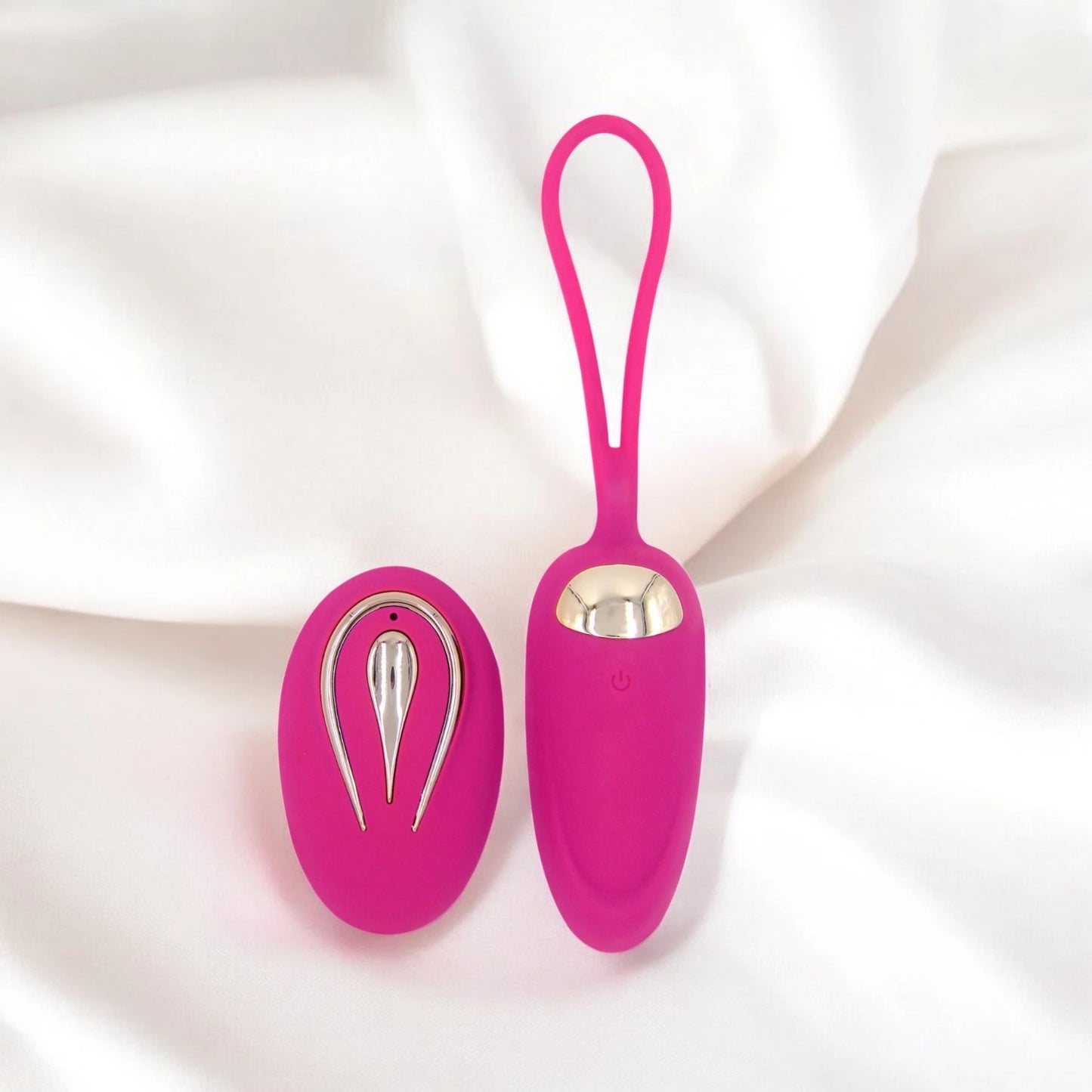 A rose red egg shaped vibrator with a remote control.