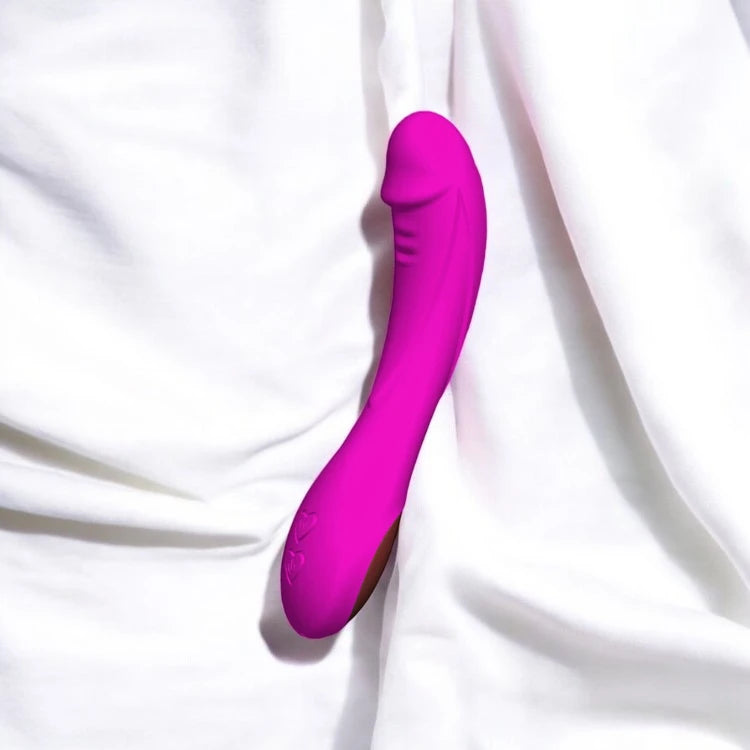 A purple ribbed vibrator with a smooth silicone finish.