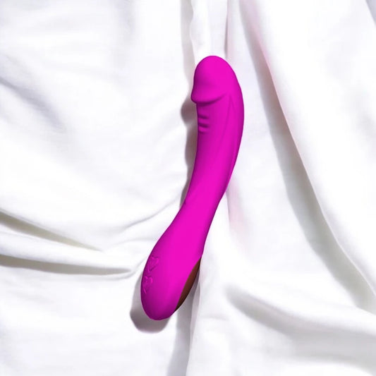 A purple ribbed vibrator with a smooth silicone finish.