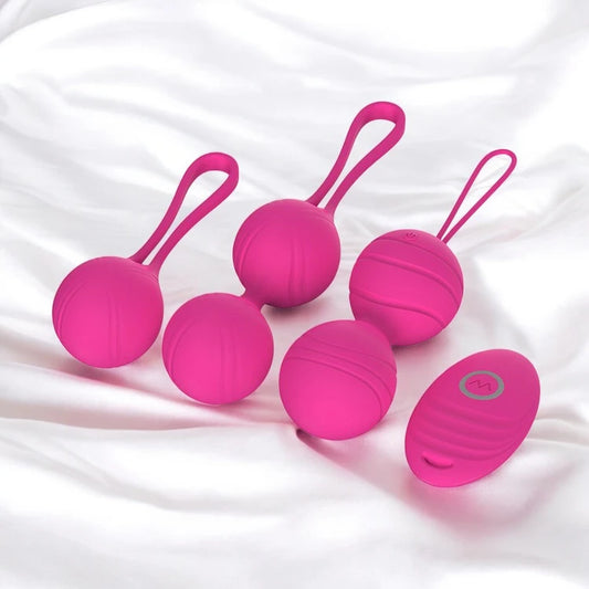 A set of Rose Red Kegel massage balls with loops for easy handling with a wireless remote control.