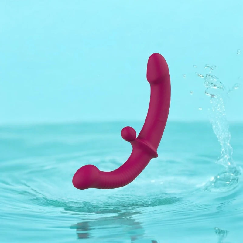 A purple double ended dildo with a remote control.